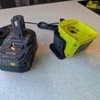 PXL_20260101_054552828.jpg Зарядное устройство Ryobi - настенное крепление