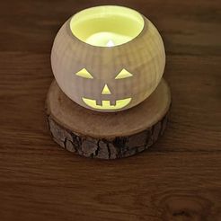 e198ef6e-2e44-4560-80d5-ba64b8d5ea5e.jpg Halloween pumpkin candle holder