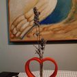9cc65b11-ae1e-4f32-8348-93e9c27f99ca.jpg Heart-shaped vase for roots or dry flowers