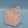 916e3004-e11d-4429-8c05-44eb5ba500a4.jpeg Exquisite Butterfly Favours Bombonier