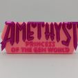 PXL_20240723_164403978.jpg Ametista - logótipo de banda desenhada