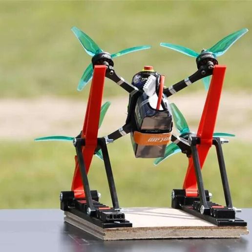 Drone racing stand pad