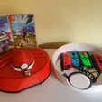 IMG_20230411_134615.jpg Stand for Nintendo Switch games in the shape of a Pokeball