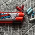 IMG_0014.jpg Cartucce autoespulsive per fucile a pompa Nerf Mega XL Double Crusher, mezze freccette e proiettili Rival