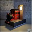 008B.jpg POTTER INSPIRED TOON TRAIN MONEY BANK/NIGHT LIGHT