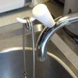 IMG_0020.jpg handle with hook for curved sink faucets