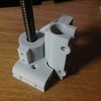 IMG_2351.jpg Free STL file Rav's prusa / mendel X ends for cylindrical 10x2 trapezoidal derlin nut・Object to download and to 3D print