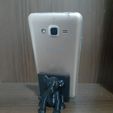 20220719_174201.jpg Customized cell phone holder with simba of the lion king.