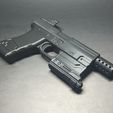 IMG_20240229_172809.jpg Puntal para pistola Glock con accesorios