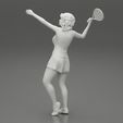 Girl-0012.jpg Woman playing tennis giving service throwing ball