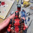 637ec5dd-4061-48ac-a9ba-58ad42c16371.jpg deadpool pack cabeza