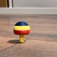 Umkehrkreisel-2.jpg Reversing spinning top magically turns to the other side