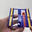 Image02j.jpg A 3D Printed Slinky Machine