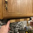 IMG_7473.jpg Ejection under cabinet cutting board mount