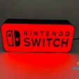 IMG_4420.jpg lâmpada de caixa com logótipo nintendo switch