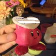 1.jpg Kirby holding a heart
