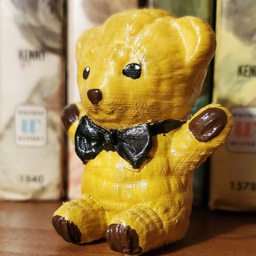 20241219_140758.jpg Cute sitting teddy bear figure.