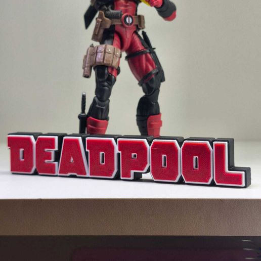 WhatsApp-Image-2025-12-27-at-1.55.51-PM.jpeg LOGÓTIPO DA BANDA DESENHADA MARVEL DEADPOOL