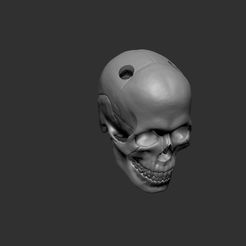 Skull for keychain.jpg Бесплатный STL файл Skull for keychain・Дизайн 3D-печати для загрузки