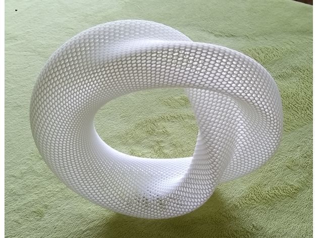 ba43417b43195489a99a07eb5c9ea1e5_preview_featured.jpg Free STL file Distorted torus (hexagonal grid)・3D printing idea to download, zeycus