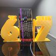 20251124_115223.jpg 6-7 (Six Seven) Book End Book Holders Version 2