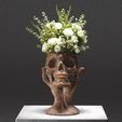 MUC1.jpg Skull and hand flowerpot