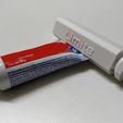 OPTIMIZAPOMO C.jpg Toothpaste juicer tubes knobs
