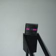 IMG_20240111_203346_460.jpg Enderman Minecraft phone holder and toy for kids. Custom colored paper eyes