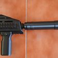 airsoft-kgm-smg-9-installed-side.jpg Airsoft KGM SMG9 suppressor