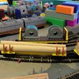 IMG_0912.jpg 50-футовый вагон для бревен/труб в масштабе N с сцепками Micro-Trains