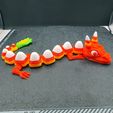 20231024_111108-copy.jpg Articulating Candy Corn Dragon Flexi Print in Place