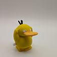 PXL_20250617_163546404.jpg Psyduck Wind Up Walker