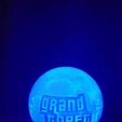 WhatsApp-Image-2025-11-04-at-22.37.16_90292fd3.jpg GTA 6 Lithophane Globe (3-Image Edition) | 10cm Sphere + Base for 001 Puck Light | Internal Supports Only | STL with Commercial Licence