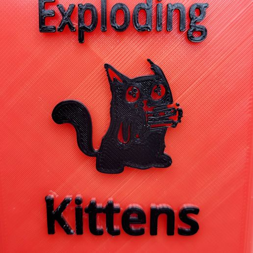 ‘om r 3 ay 2 SS) “4 = Exploding Kittens Deck Box