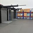 Warehouse-with-loading-docks-2.jpg Modular Warehouse with Loading Dock – Motorized Door & Adjustable Ramp - 1:14 Scale