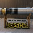 20200406_223341.jpg Lightsaber Holder (Luke Skywalker, name can be change)