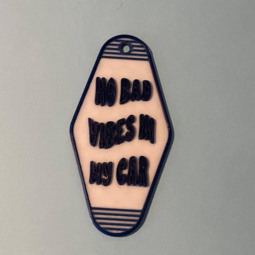 487922932_24028225143431649_7158955128129687830_n.jpg Retro no bad vibes in my car motel keychain