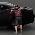 3DG-0003.jpg gangster man in a hoodie and cap shooting a gun behind the car