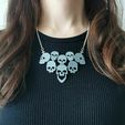 01.jpg FLEXIBLE Skull Pendant