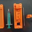 parts.jpg Mini syringe pump with parts from optical drive
