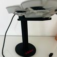 00c5e406-102e-4083-ac8c-96672eb70fef.jpeg DJI Neo Stand with charging cable