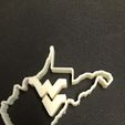 2014-12-09_19.47.20.jpg WVU logo with Outline of the state of West Virginia.