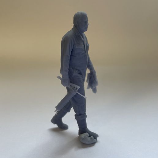 Seaman walking with grease gun