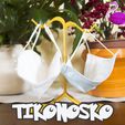 cover.jpg TiKonosKo facemask holder