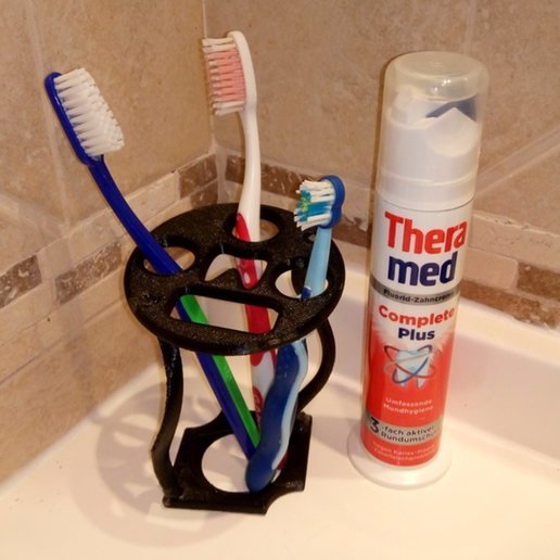 Toothbrush and toothpaste holder