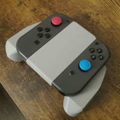 b70f417f-cc36-423e-8106-586f7884a748.jpg Комфортная рукоятка Nintendo Switch Joy-Con