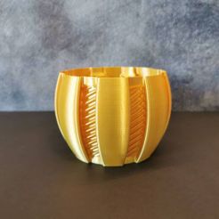 vase-1.jpg Orange planter with stripes