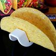 cda99b71ed7a49415121c770e8458db8_display_large.jpg Taco Holder - Rolls over for easy filling / Flat base holds Taco upright when served