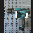 makita10v.jpg Angle holder for hand drills for Küpper perforated walls