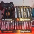 293514200_438377288140744_4105080257491191375_n.jpg PLAYSTATION 1 DOUBLE GAME CASES HOLDER